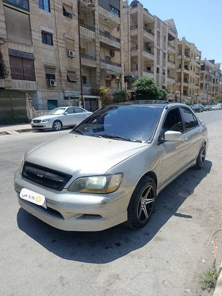 ميتسوبيشي لانسر 2003 - صورة 1