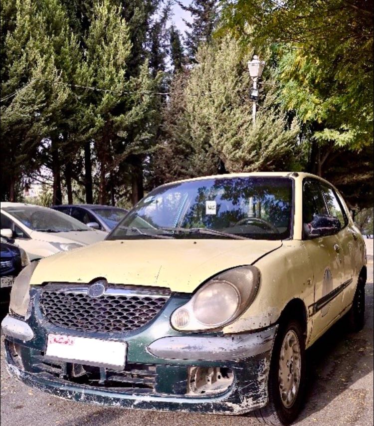 دايهاتسو سيريون 2004 - صورة 1