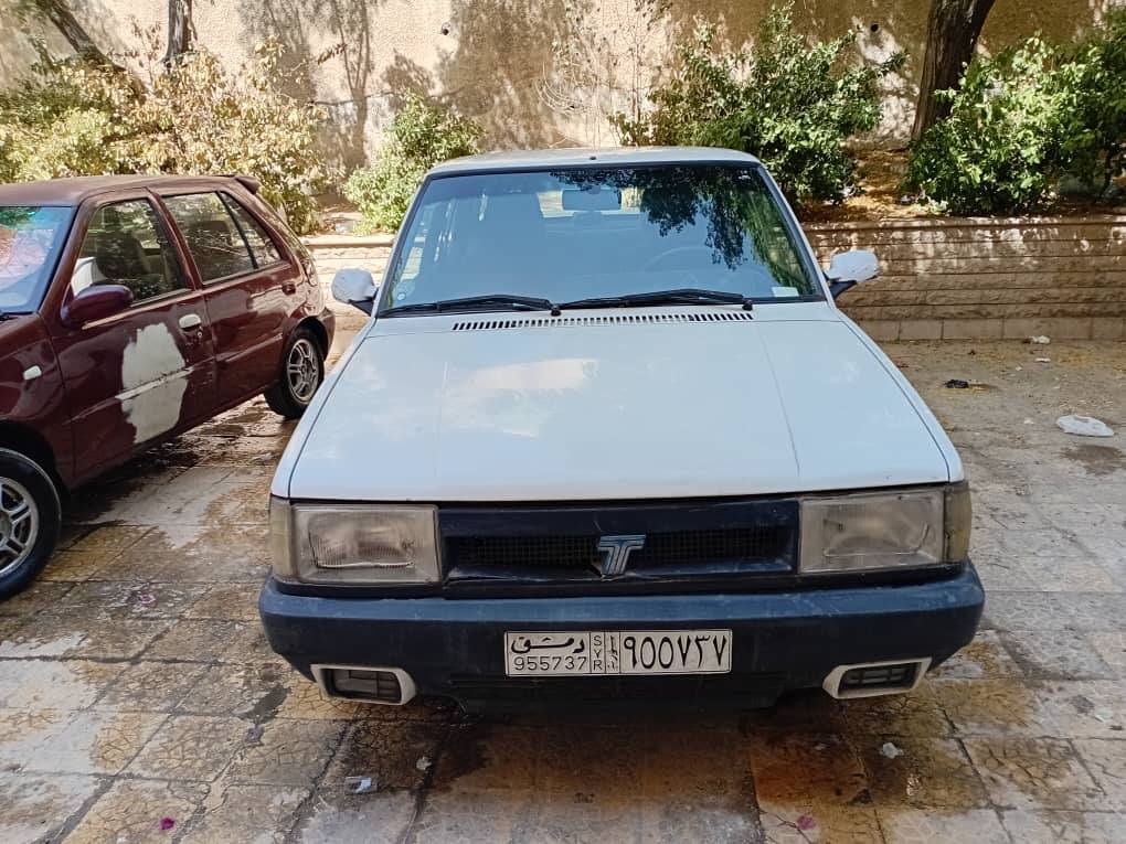 توفاش دوغان 2003 - صورة 1