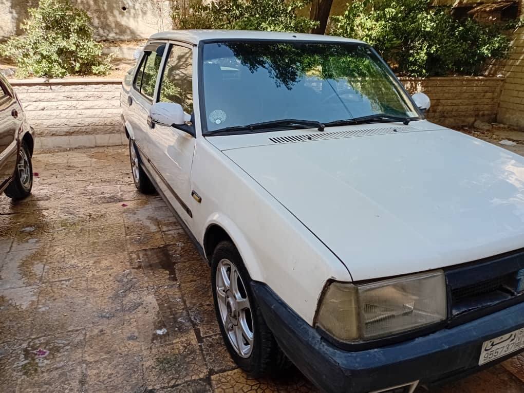 توفاش دوغان 2003 - صورة 4