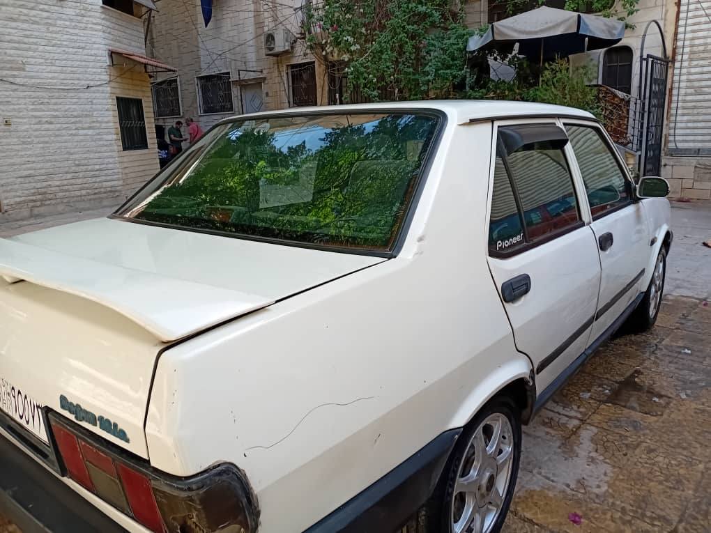 توفاش دوغان 2003 - صورة 5