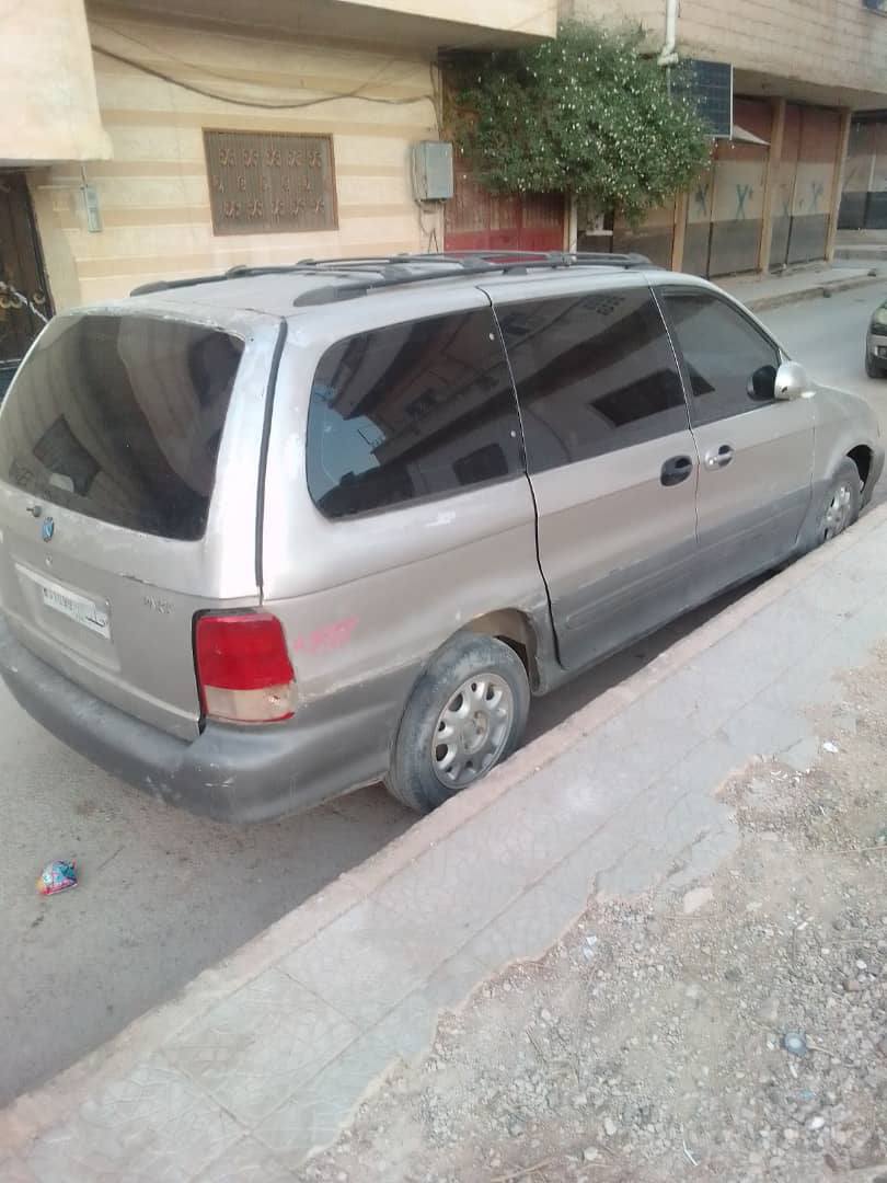 كيا كرنفال 2001 - صورة 5