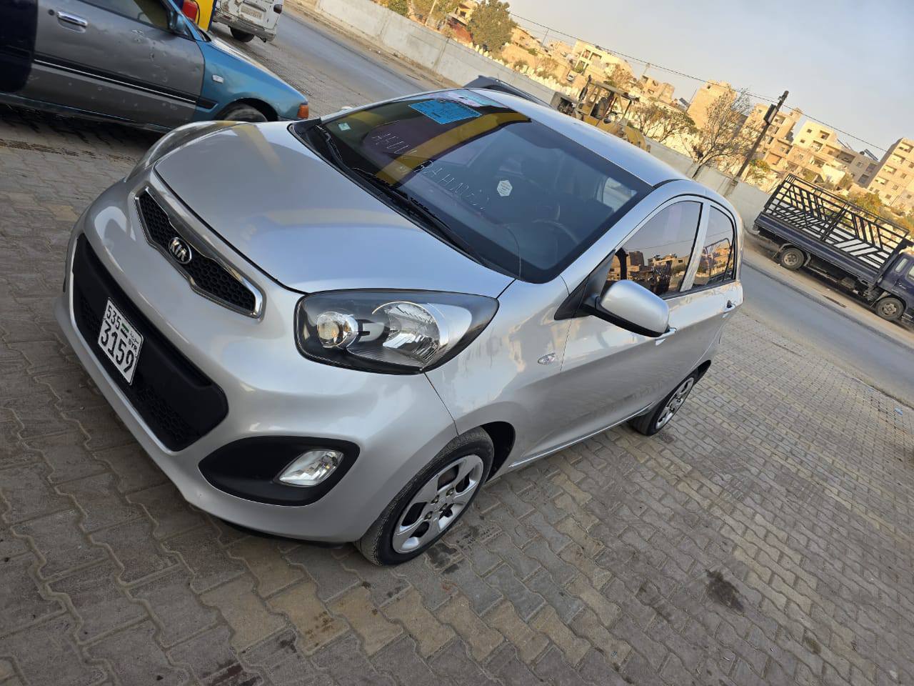 كيا مورنك 2012 - صورة 1