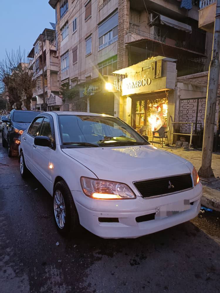 متسوبيشي لانسر 2002 - صورة 2