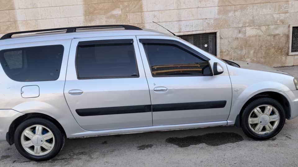 رينو لوغان 2010 - صورة 1