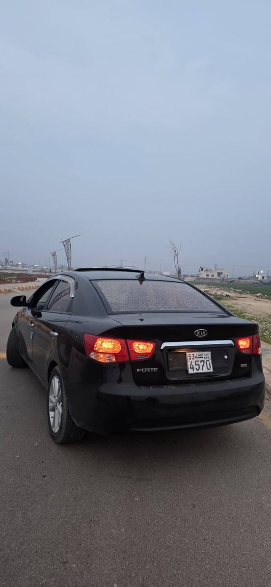 كيا فورتي 2011 - صورة 2