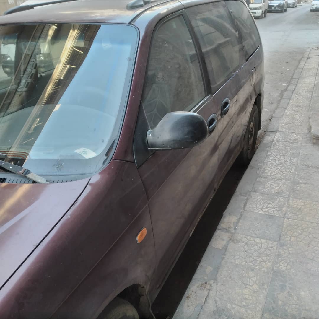 كيا كرنفال 2002 - صورة 5