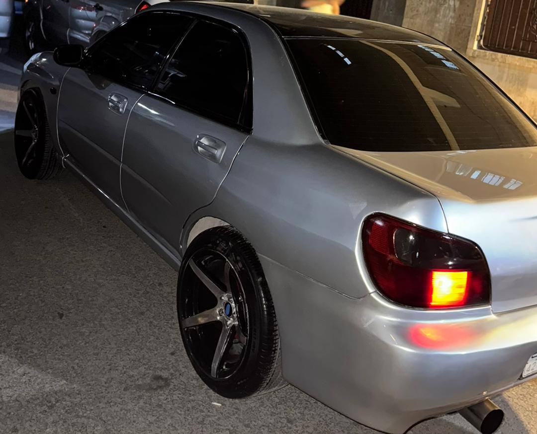 سوبارو امبريزا 2001 - صورة 1