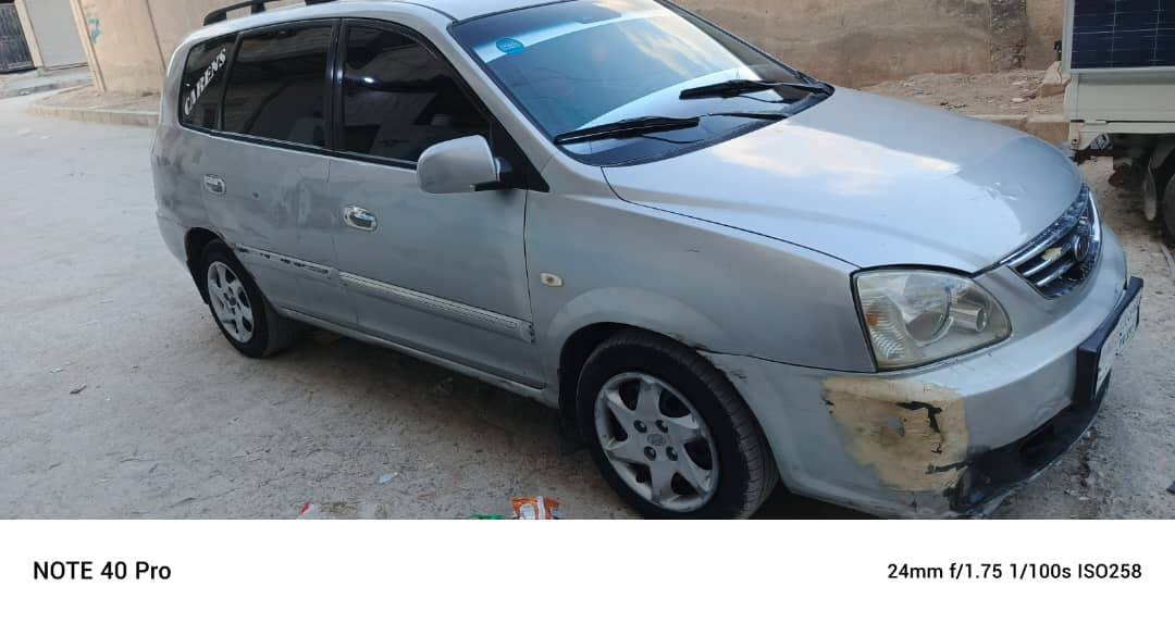 كيا كارينز 2004 - صورة 3