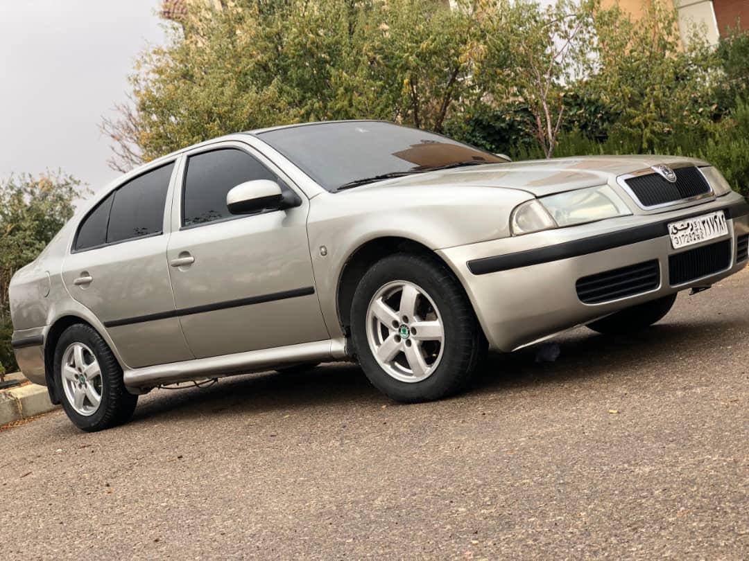 كيا مورنيغ 2012 - صورة 1