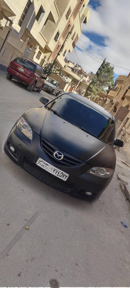 كيا مورنيغ 2012 - صورة 4