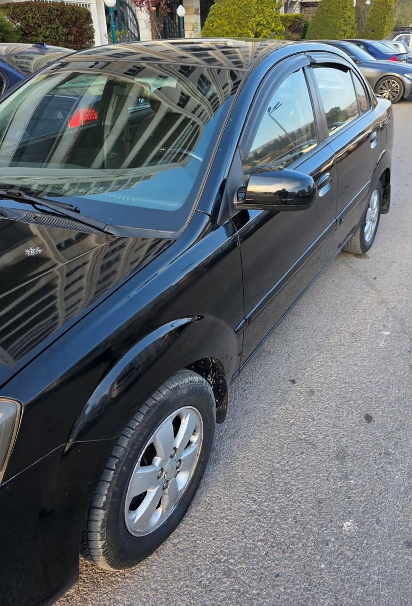 كيا ريو 2011 - صورة 1