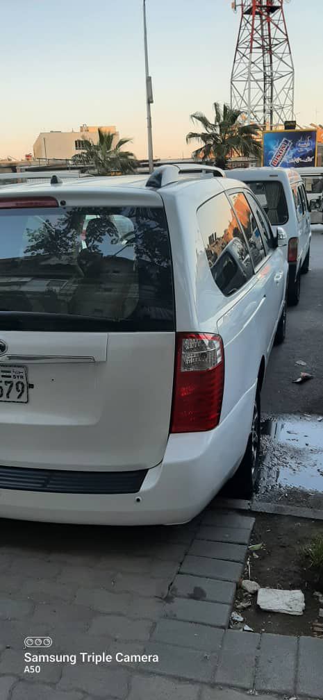 كيا سيدونا 2014 - صورة 2