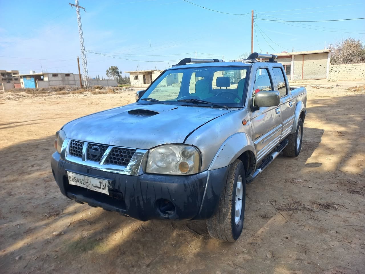 نيسان نيفارا 2000 - صورة 1