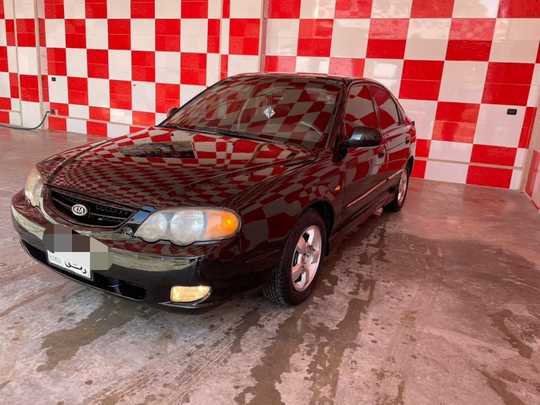 كيا شوما 2003