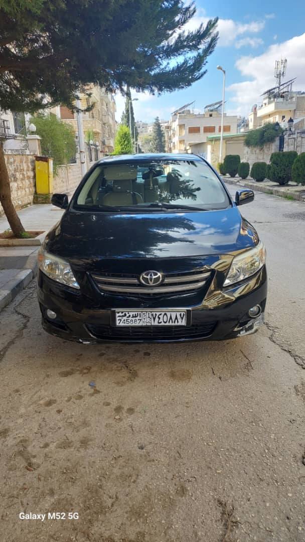 تويوتا كورولا قصة الكامري 2010 - صورة 1