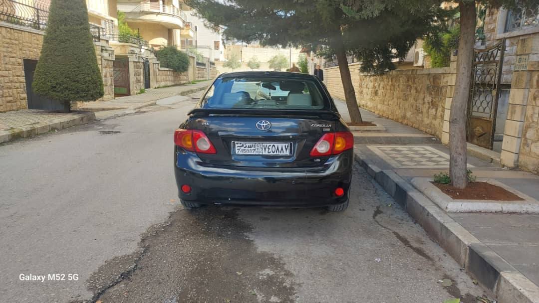 تويوتا كورولا قصة الكامري 2010 - صورة 3