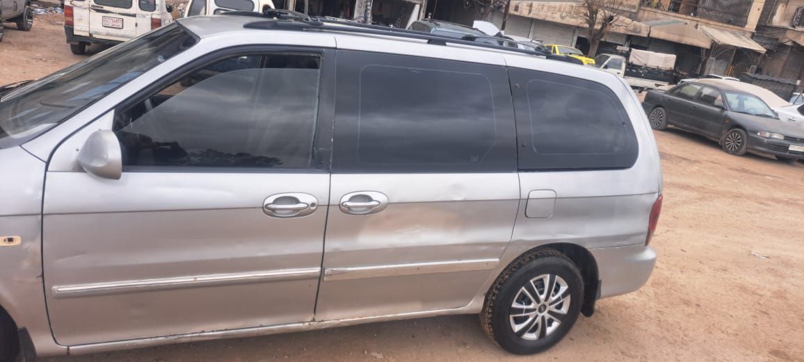 كيا كرنفال 2003 - صورة 5