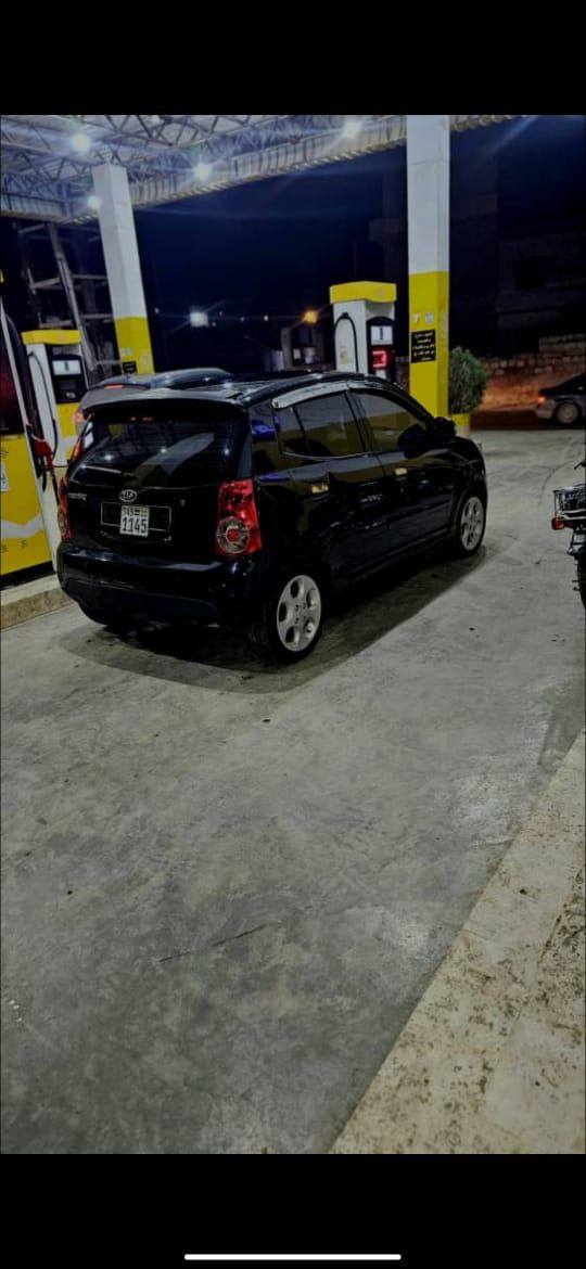 كيا مورنيغ 2008 - صورة 2