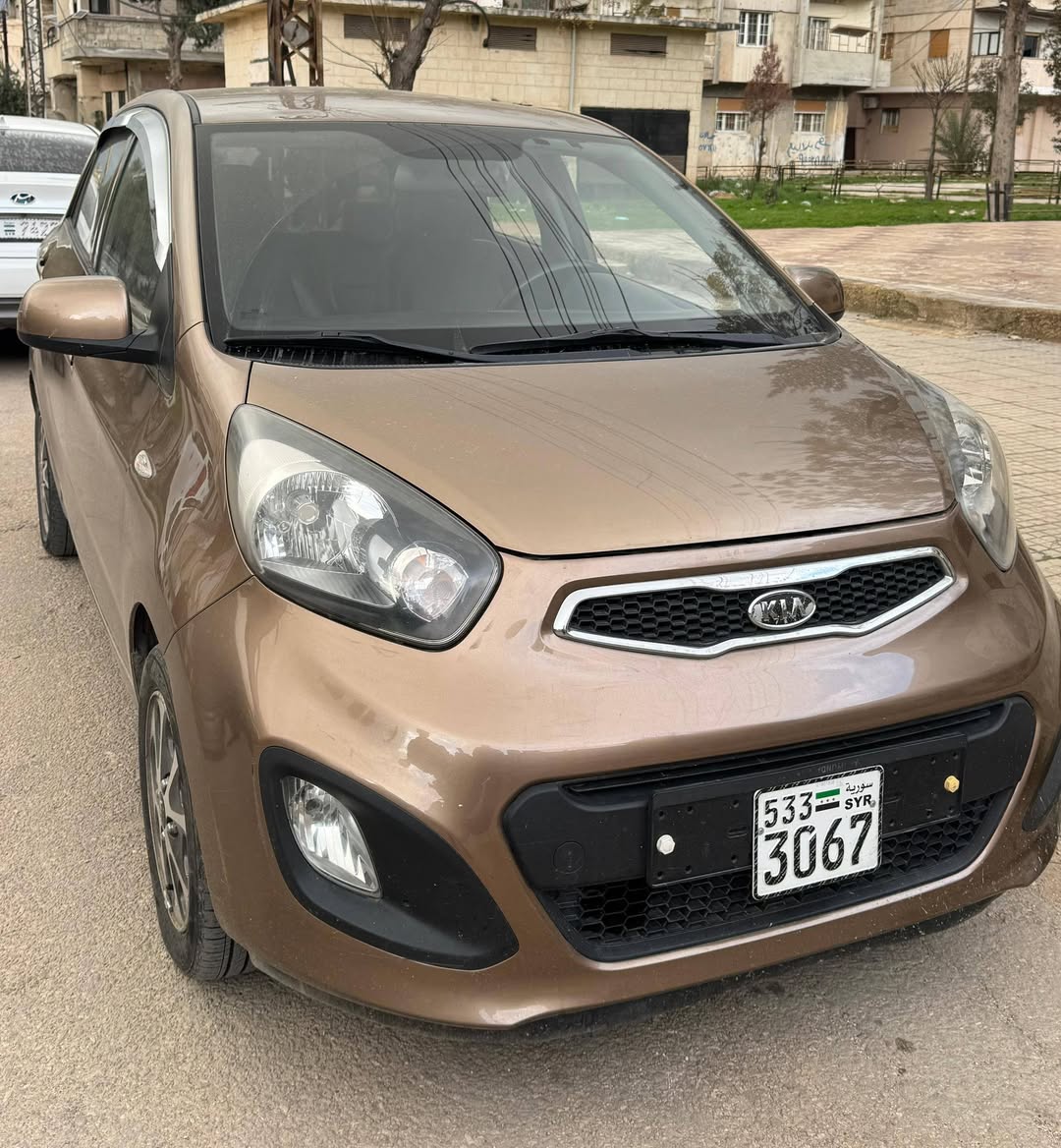 كيا مورنيغ 2011 - صورة 1