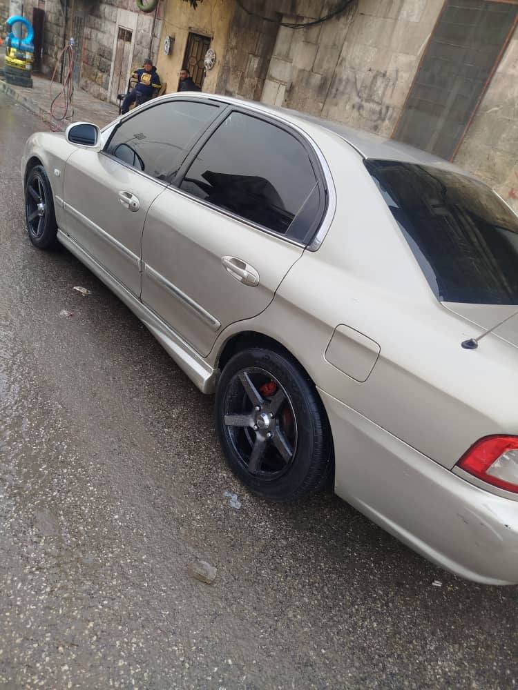 كيا أوبتيما 2004 - صورة 4