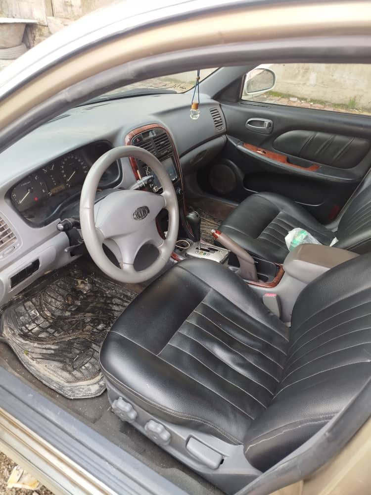 كيا أوبتيما 2004 - صورة 5