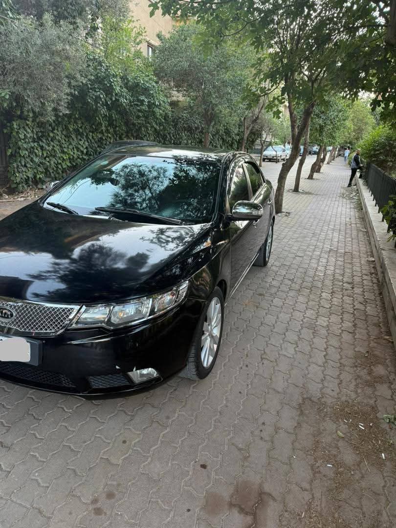 كيا سيراتو 2010 - صورة 3