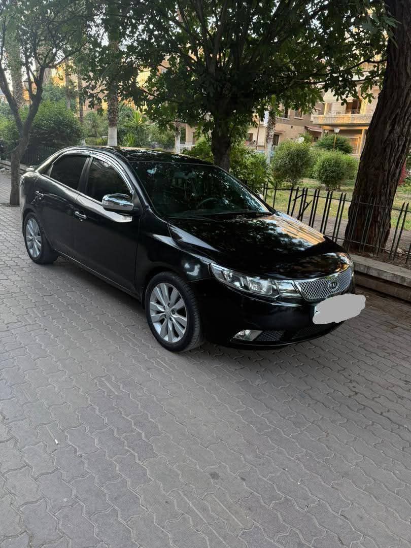 كيا سيراتو 2010 - صورة 4