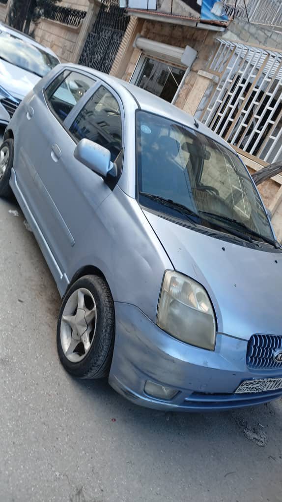 كيا مورنيغ 2006 - صورة 4