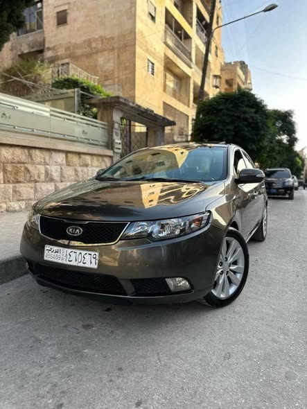 كيا فورتي 2011 - صورة 2