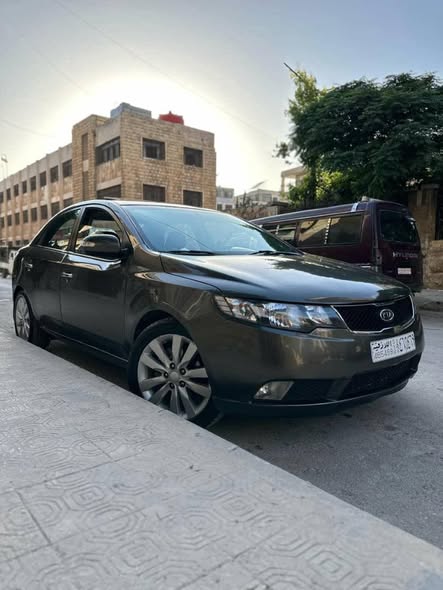 كيا فورتي 2011 - صورة 3