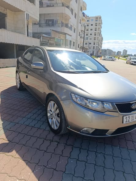 كيا فورتي 2010 - صورة 3