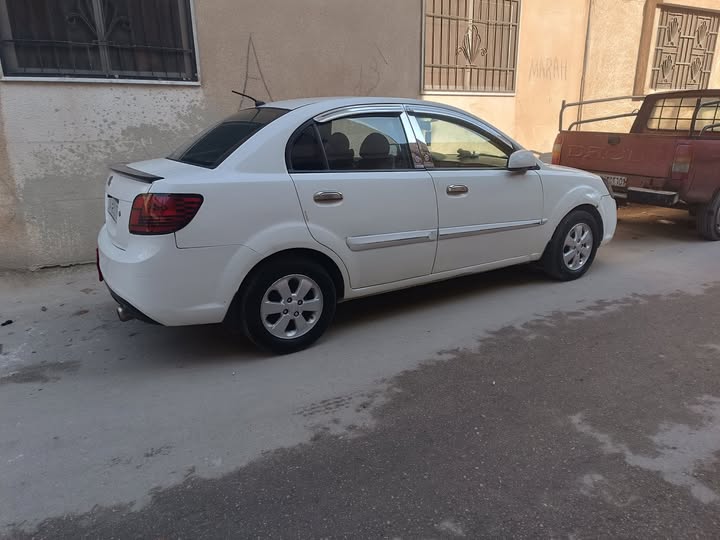 كيا ريو 2011 - صورة 1