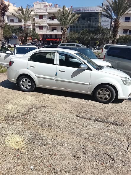 كيا ريو 2011 - صورة 1