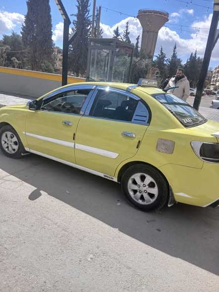 كيا ريو 2011 - صورة 1