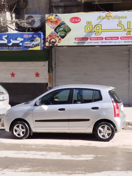 كيا مورنيغ 2007 - صورة 1