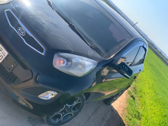 كيا مورنغ 2012 - صورة 1