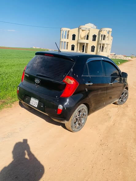 كيا مورنغ 2012 - صورة 2