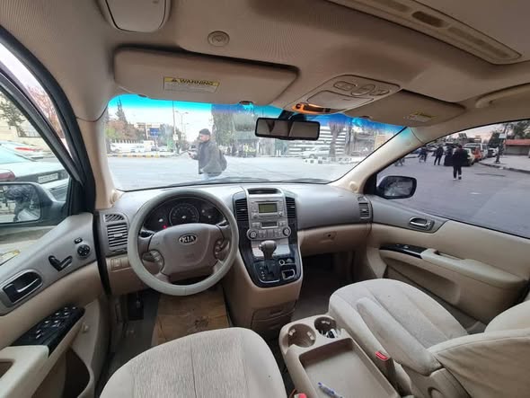 كيا سيدونا 2014 - صورة 2