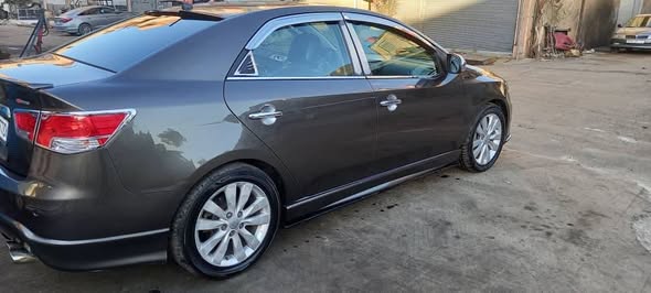 كيا فورتي 2012 - صورة 2