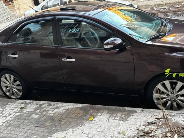 كيا فورتي 2010 - صورة 1