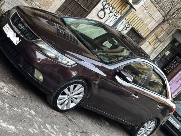 كيا فورتي 2010 - صورة 4