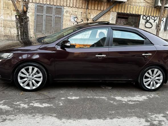 كيا فورتي 2010 - صورة 5