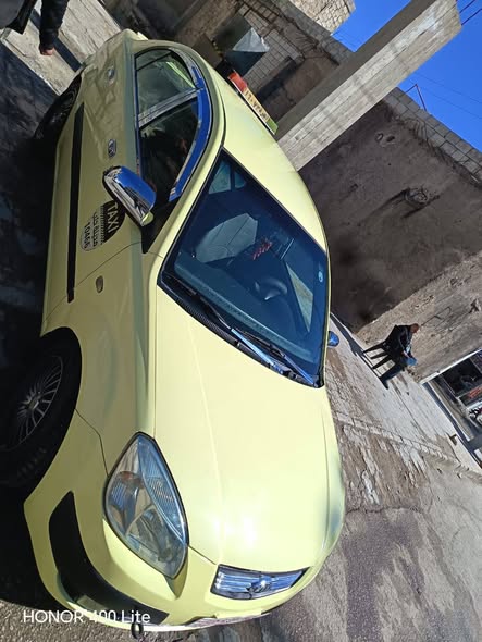 كيا ريو 2010 - صورة 3