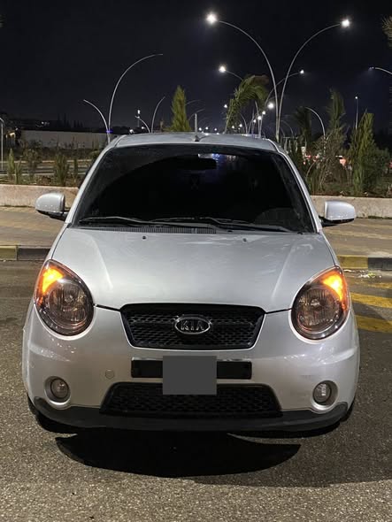 كيا مورنيج 2010 - صورة 1