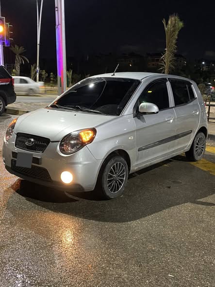 كيا مورنيج 2010 - صورة 2