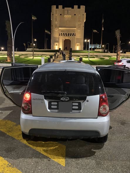 كيا مورنيج 2010 - صورة 5