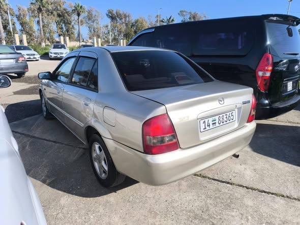 مازدا 323 2002 - صورة 4