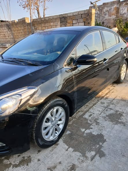 كيا كي 3 2013 - صورة 2