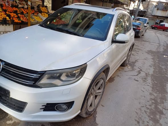 فولكس فاجن تيغوان 2014 - صورة 3